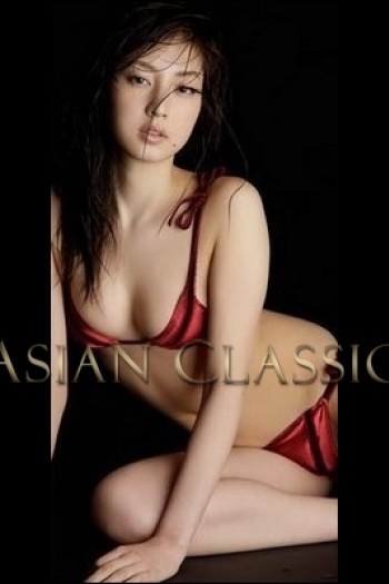 Exclusive Black haired London escort CAROLINE is 5'6
