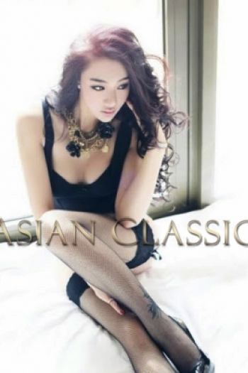 Exclusive Black haired London escort CHONN is 5'6