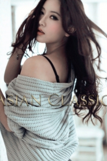 Exclusive Dark Brown haired London escort OMIKA is 5'6